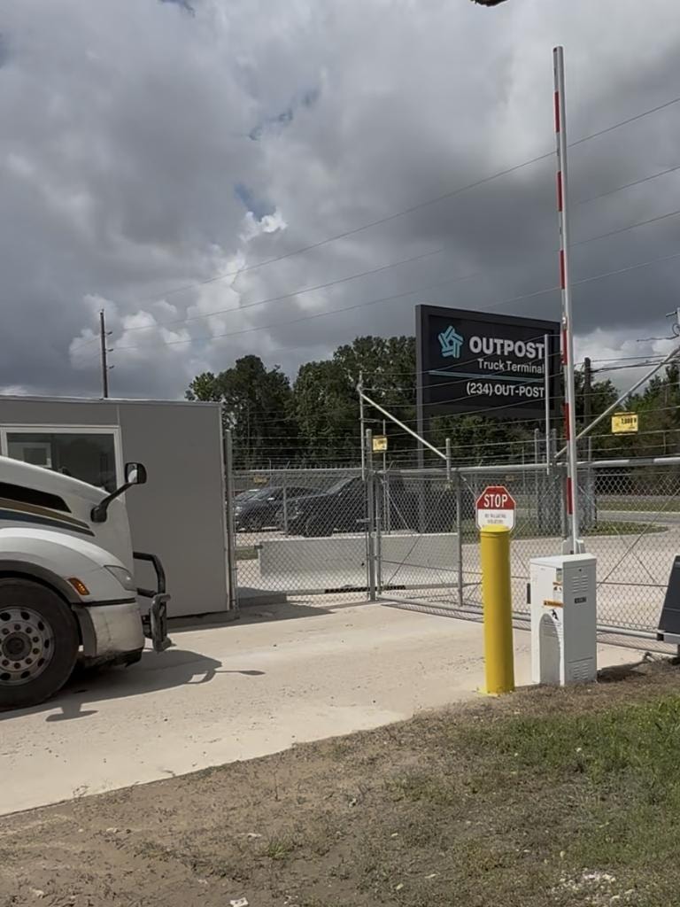 Barrier arm gate operator at commercial entrance — Access Pro Gate Company